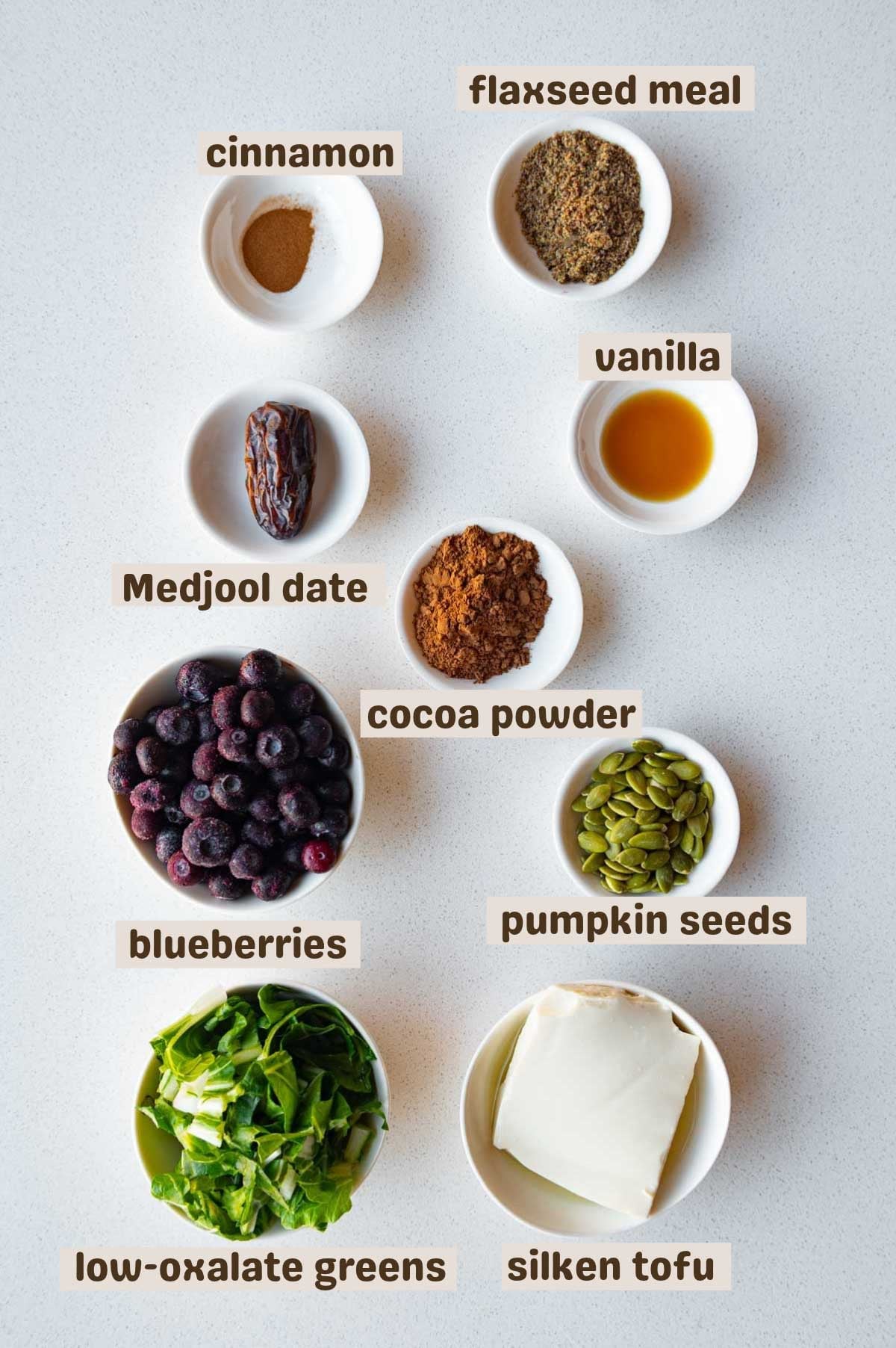 Frozen organic blueberries, natural cocoa powder, pumpkin seeds, silken tofu, low-oxalate greens, Medjool date, cinnamon, and vanilla.