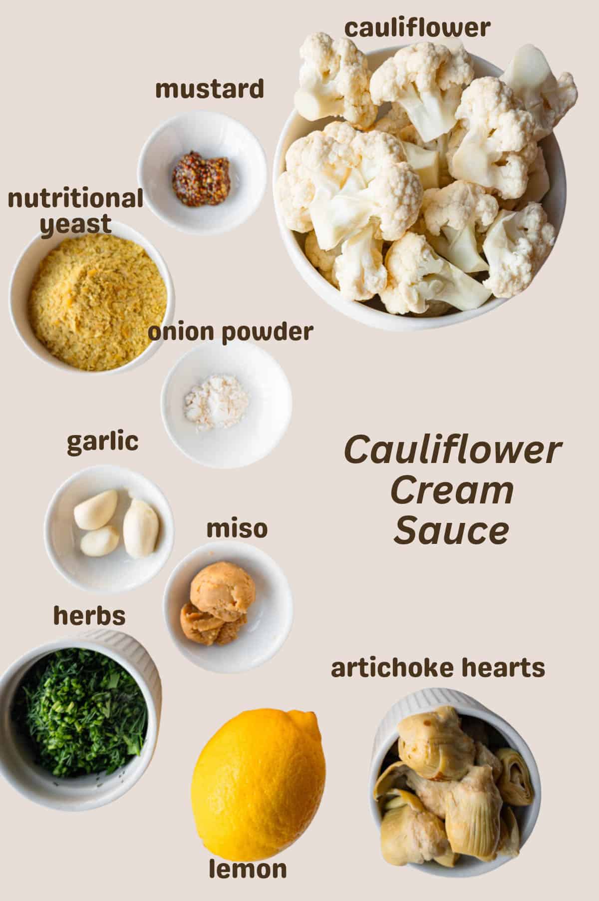 Cauliflower florets, lemon, artichoke hearts, fresh herbs, miso, garlic, onion powder, nutritional yeast, and mustard.
