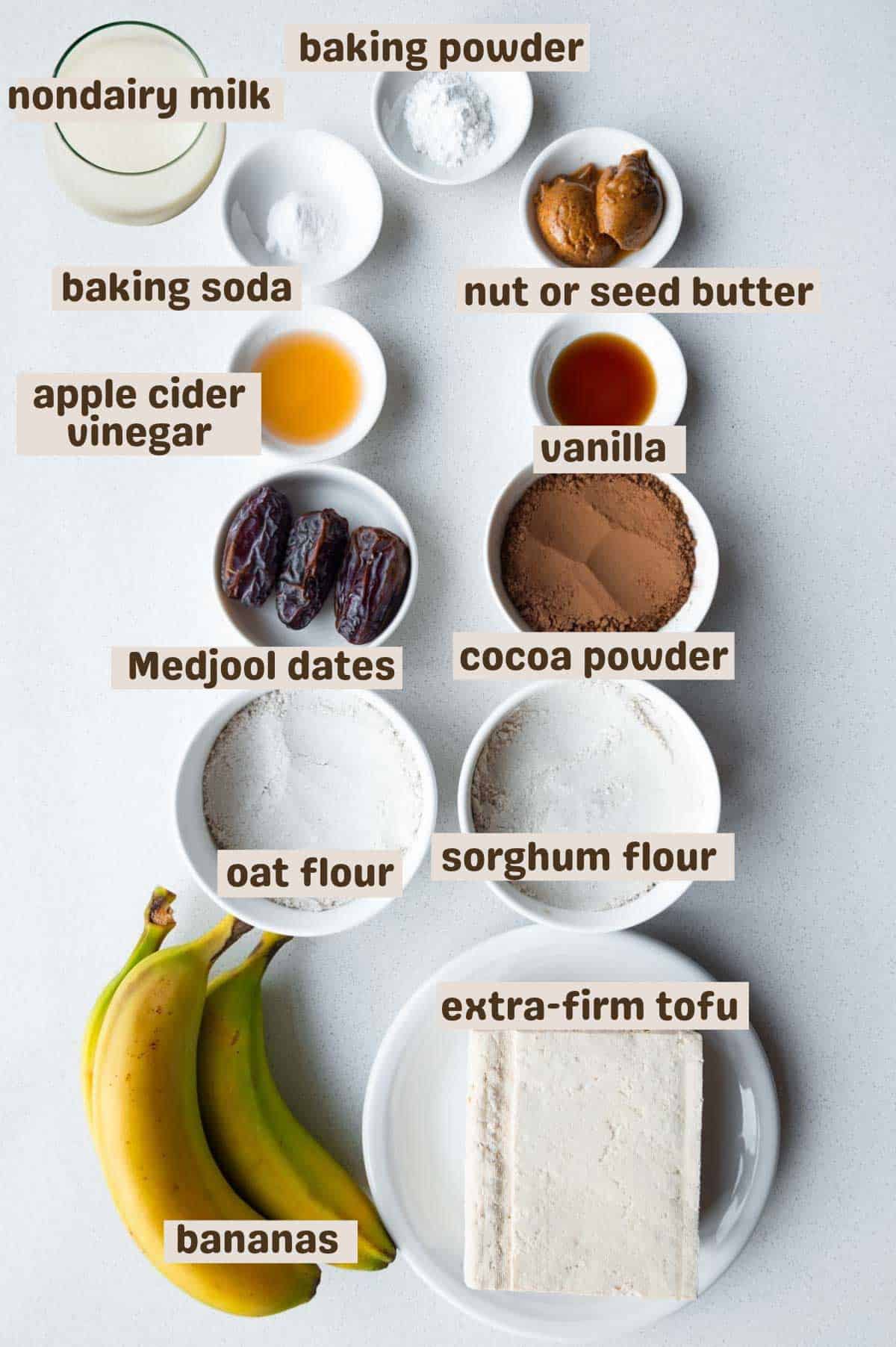 Nondairy milk, baking powder, baking soda, oat flour, sorghum flour, bananas, extra-firm tofu, cocoa powder, Medjool dates, apple cider vinegar, vanilla, and nut butter.