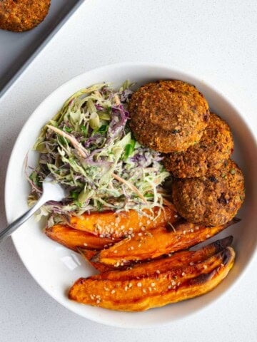 Iron-rich recipe bean burgers with sweet potato and slaw.