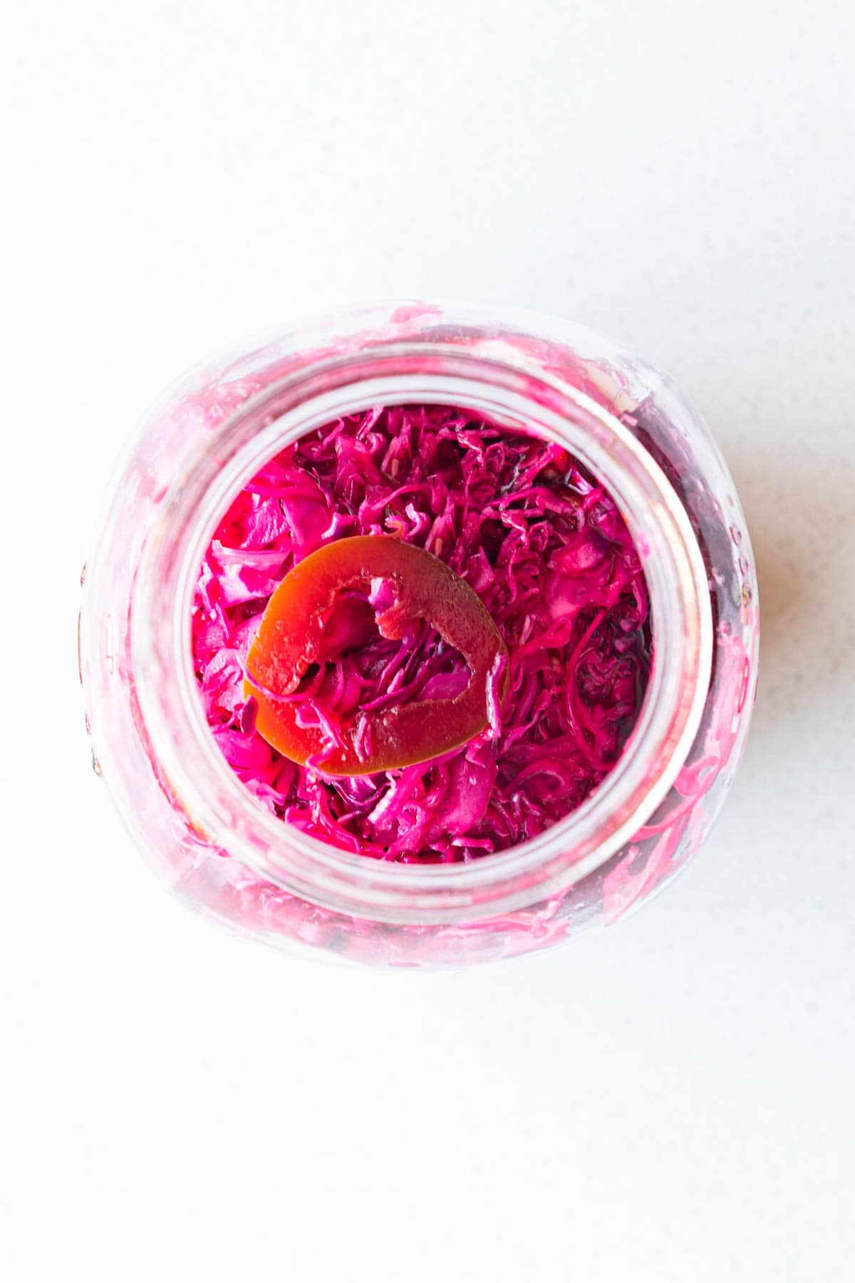 Pickled red cabbage in a mason jar.