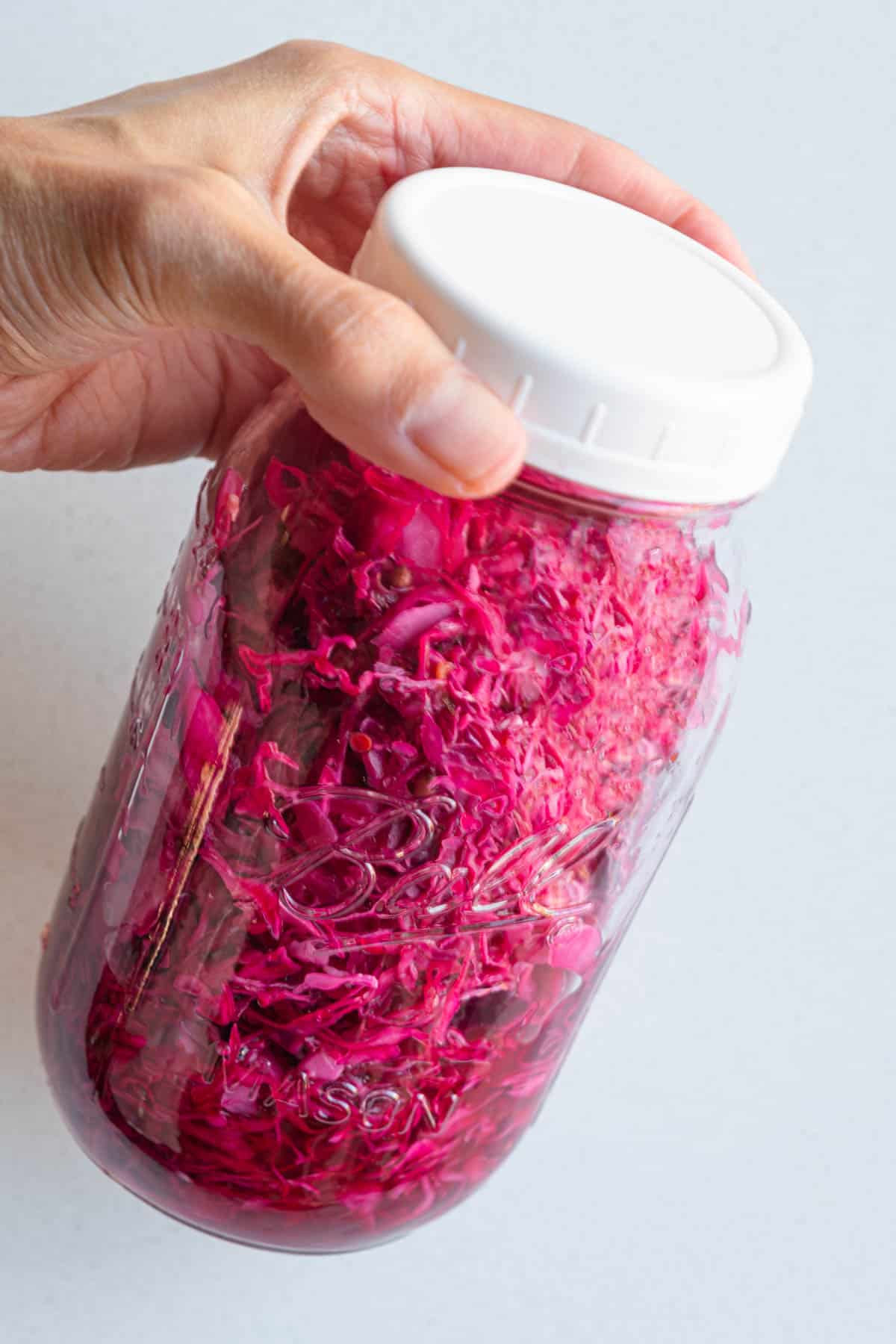Pickled red cabbage in a mason jar.