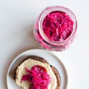 Pickled red cabbage on toasted rye bread with hummus.