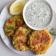Potato fritters with tzatziki sauce.
