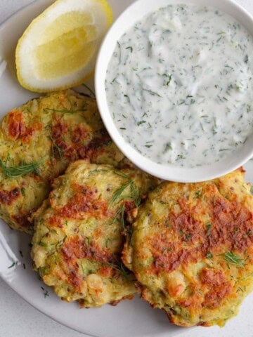 Potato fritters with tzatziki sauce.