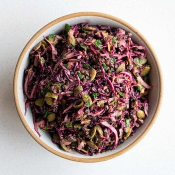 Red cabbage lentil crunch salad in a bowl.