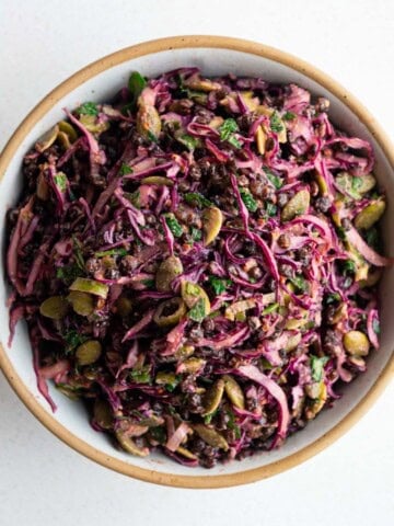 Red cabbage lentil crunch salad in a bowl.
