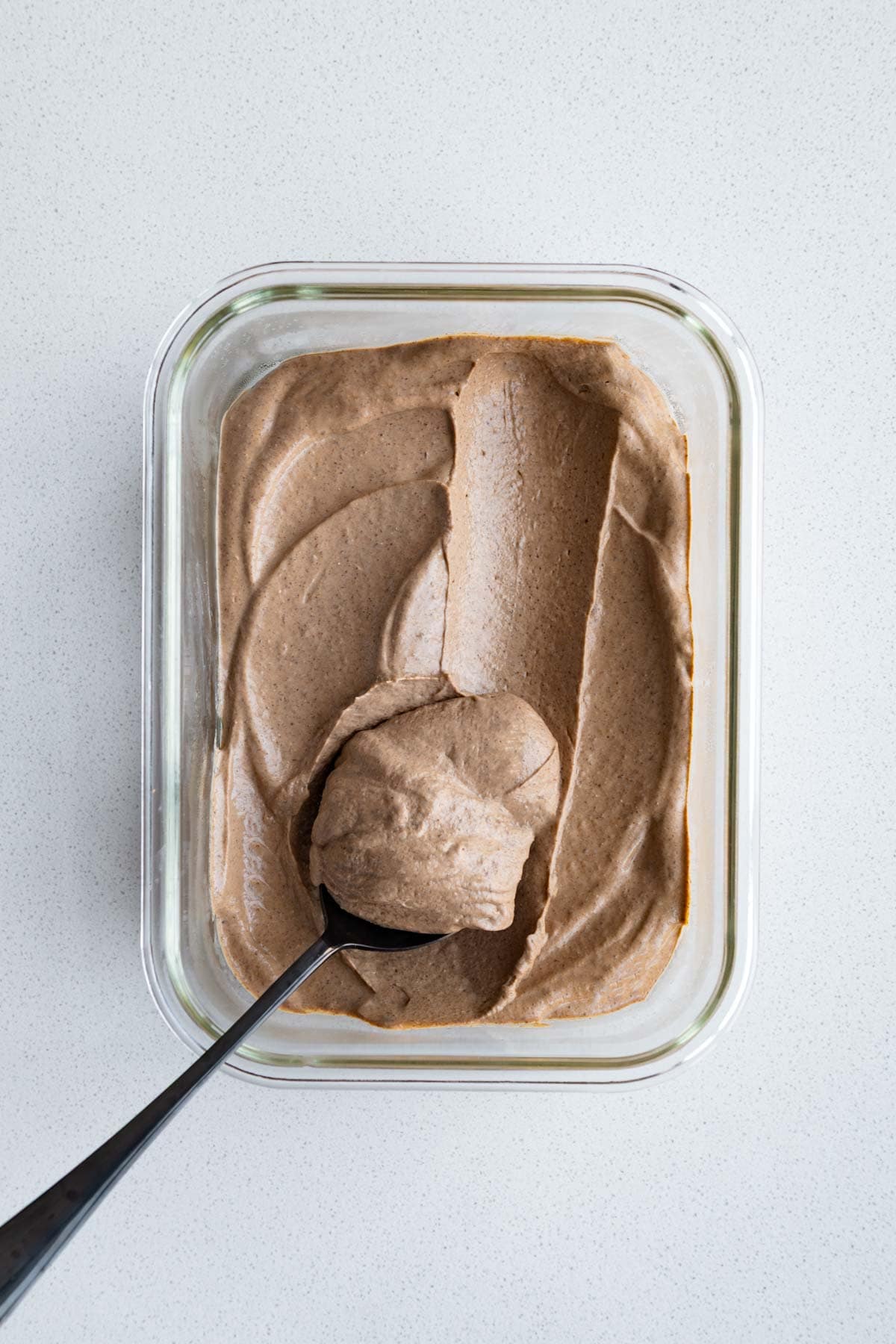 Silken tofu mousse in a glass dish.